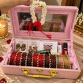 Karwachauth Special Premium Hamper With Name ( 60 diamond bangles + 11 Heavy Ghungroo Bangles + Bindi + Mehndi + Nail Paint + 2 jhumka + Sindur + Lipstick + Gajra + Kajal )